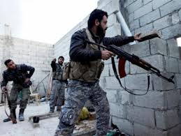 تشييع جنازه يك پاسدار كه در حومه درعا كشته شده است